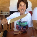 Maria gets her hands on one of the long knives at the Churrasco