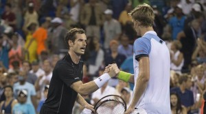 Andy Murray of Britain (L) shakes hands after losing to Kevin Anderson