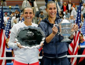 Italians Roberta Vinci and Flavia Pennettashow their delight at playing the US Open finals (AP Photo/Julio Cortez)