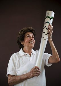 Maria Esther Bueno with a replica of the Olympic Torch