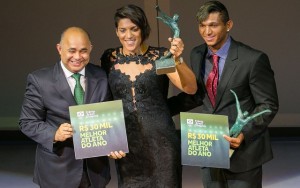 Minister of Sports is George Hilton (L) awards Marathon Swimming Ana Marcela Cunha (2L) and Canoe Sprint Isaquias Queiroz the Best Female Athlete of 2015 and the Best Male Athlete of 2015, respectively.
