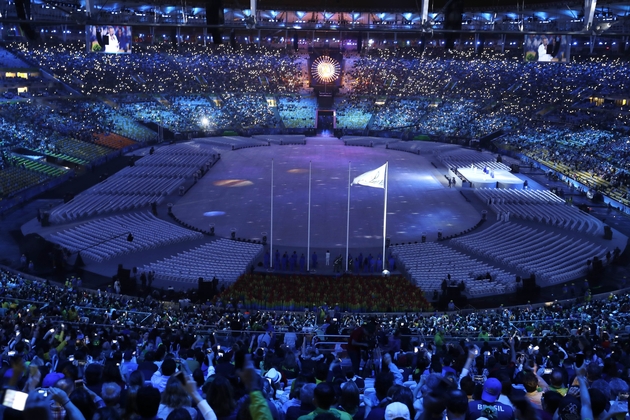A celestial scene is projected on the floor [AP Photo/Charlie Riedel]