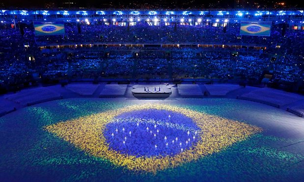 The National Flag takes shape on the floor of the stadium