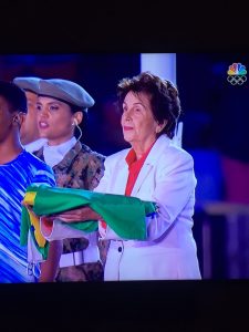 Maria Esther Bueno holds the Brazilian flag at the Closing Ceremony of Rio 2016