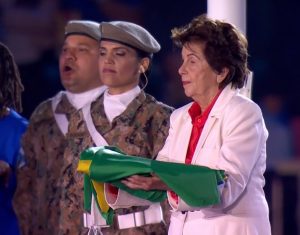 Maria Esther Bueno holds the Brazilian flag at the Olympic Closing Ceremony of Rio 2016